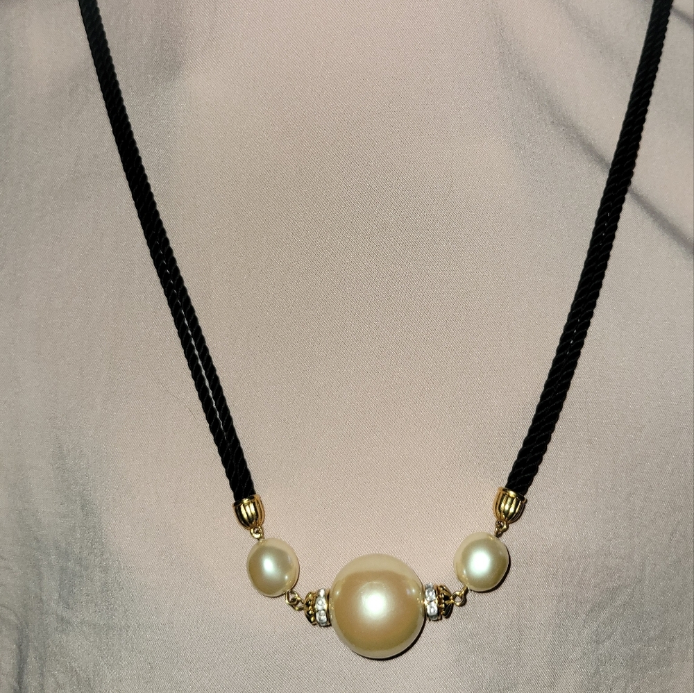 Black corded necklace with faux pearl beads